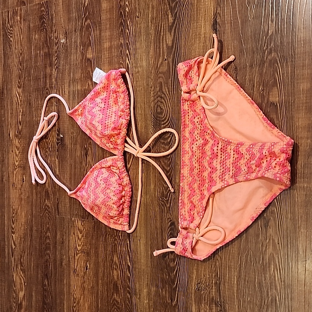 Bikini suit set. Top large(11-13). Bottom small(3-5) orange and pink